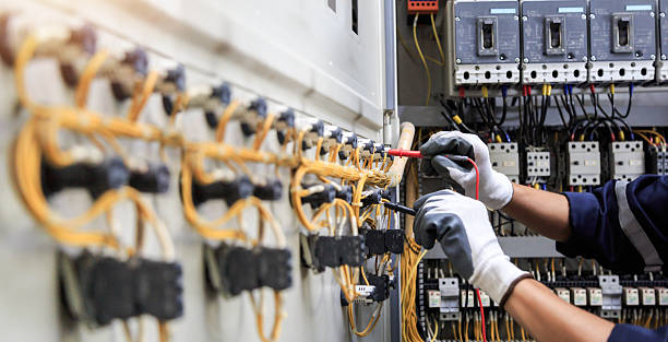 Professional Electrician technician working in Laguna Park, TX